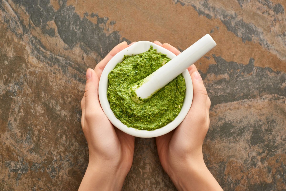 Spinach Pesto in mortar and pestle