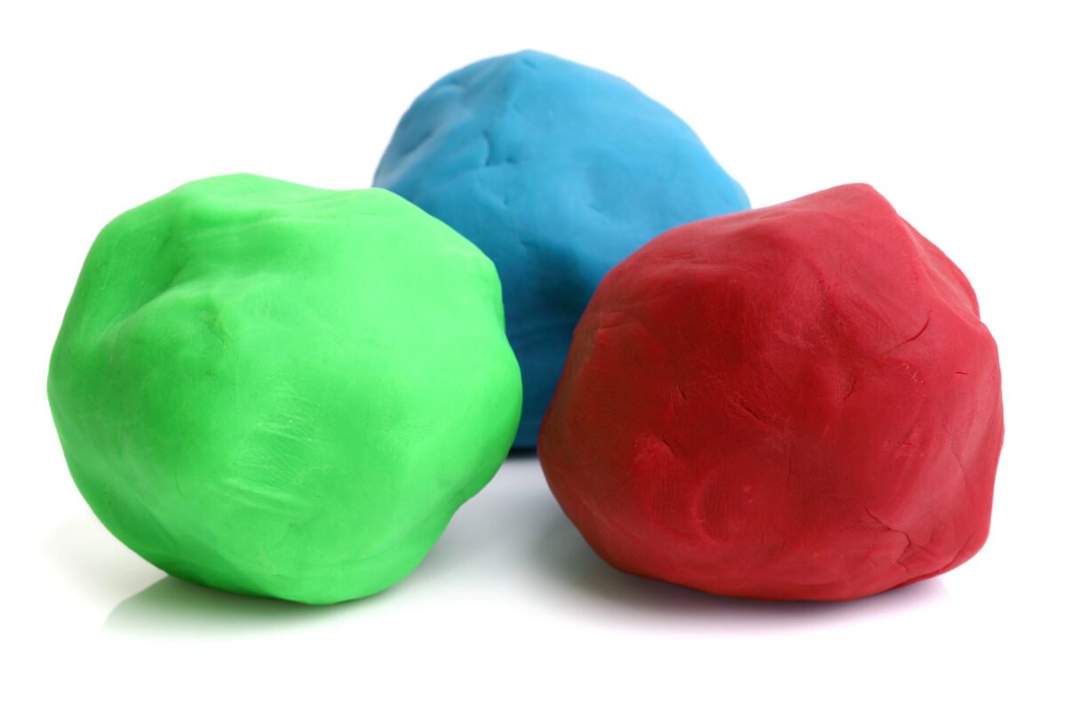 Green, blue, and red balls of homemade playdough