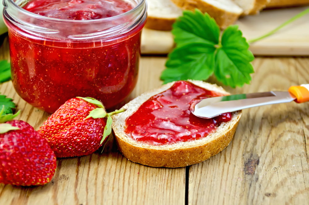 Piece of bread with homemade strawberry jam
