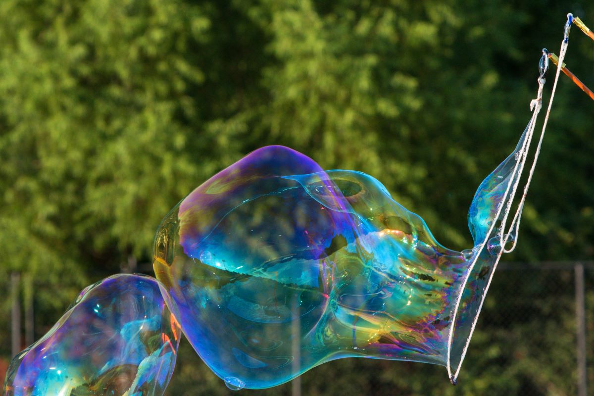 outdoor image of wand with giant bubble