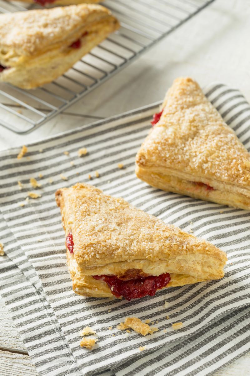 cherry turnovers on striped cloth