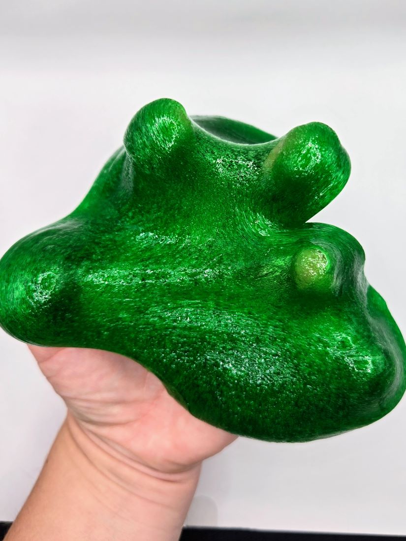 hand holding slime